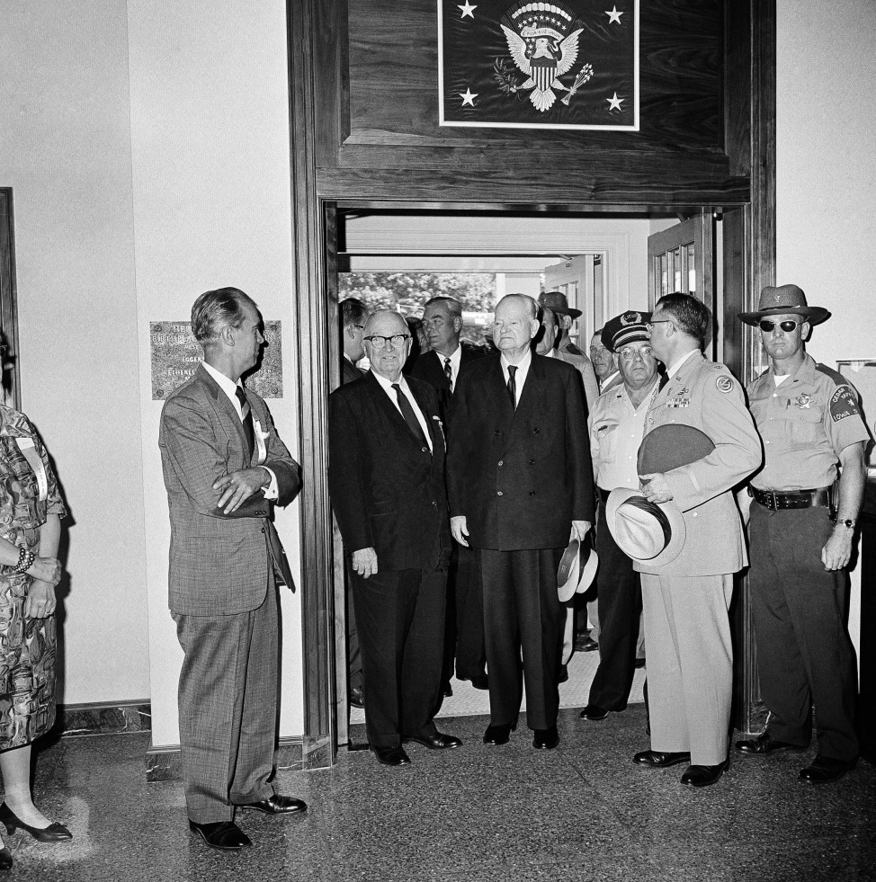 Former Presidents Herbert Hoover, right, and Harry Truman walk through doorway of the Herbert Hoover Presidential Library at West Branch, Iowa on August 10, 1962. The two took a short tour of the library during dedication ceremonies in Hoover's birthplace on his 88th birthday. (AP Photo)