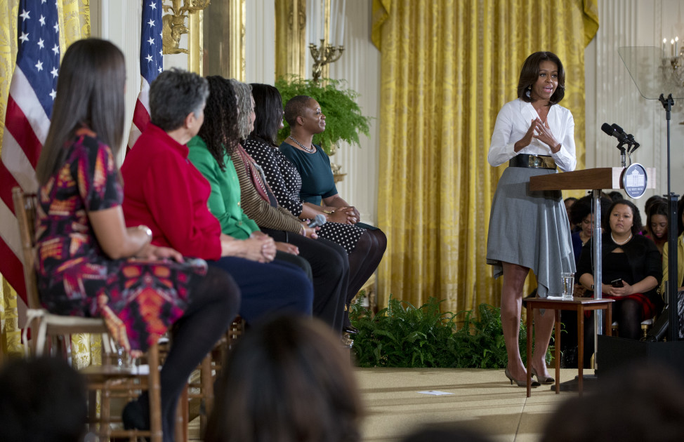 First lady Michelle Obama, right, speaks at the White House in Washington, Feb. 20, 2015, during an event commemorating Black History Month. (AP Photo) 
