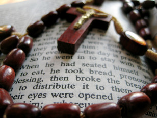 Bible and rosary (Photo by Flickr user Chris Sloan via Creative Commons license) 