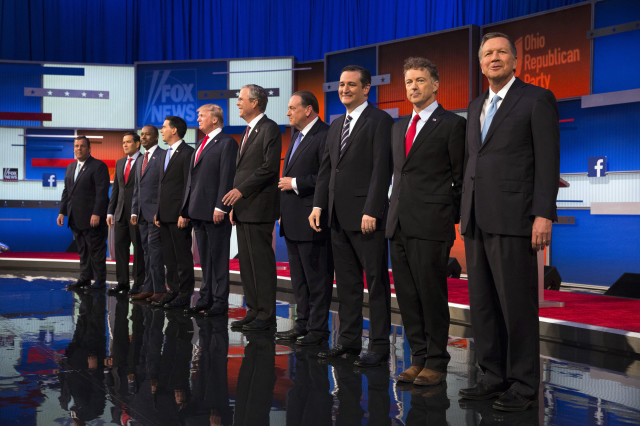 Republican presidential candidates from left, Chris Christie, Marco Rubio, Ben Carson, Scott Walker, Donald Trump, Jeb Bush, Mike Huckabee, Ted Cruz, Rand Paul, and John Kasich take the stage for the first Republican presidential debate, Aug. 6, 2015, in Cleveland, Ohio. (AP Photo)