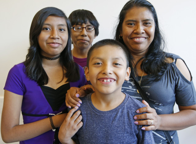 In 2013, 28 percent of the 41.3 million immigrants in the United States were from Mexico. Here, Mexican immigrant Martina Juárez, 40, right, poses with her daughter and grandsons in New York, Aug. 26, 2015. (AP Photo)