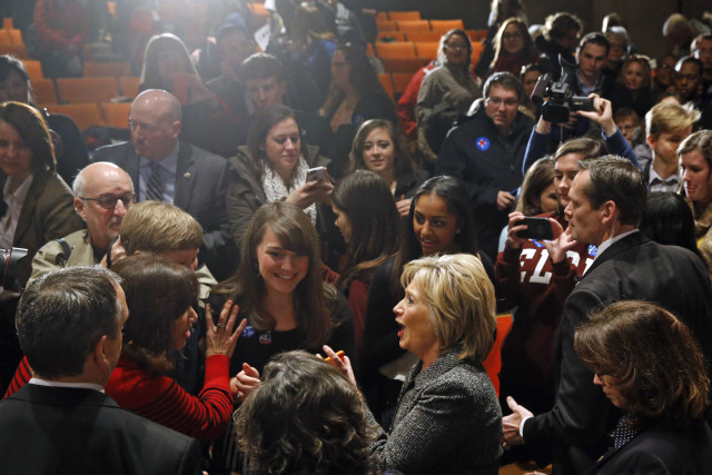 Democratic presidential candidate Hillary Clinton, bottom right, greets attendees after speaking at Iowa State University in Ames, Iowa, Jan. 12, 2016. (AP Photo)
