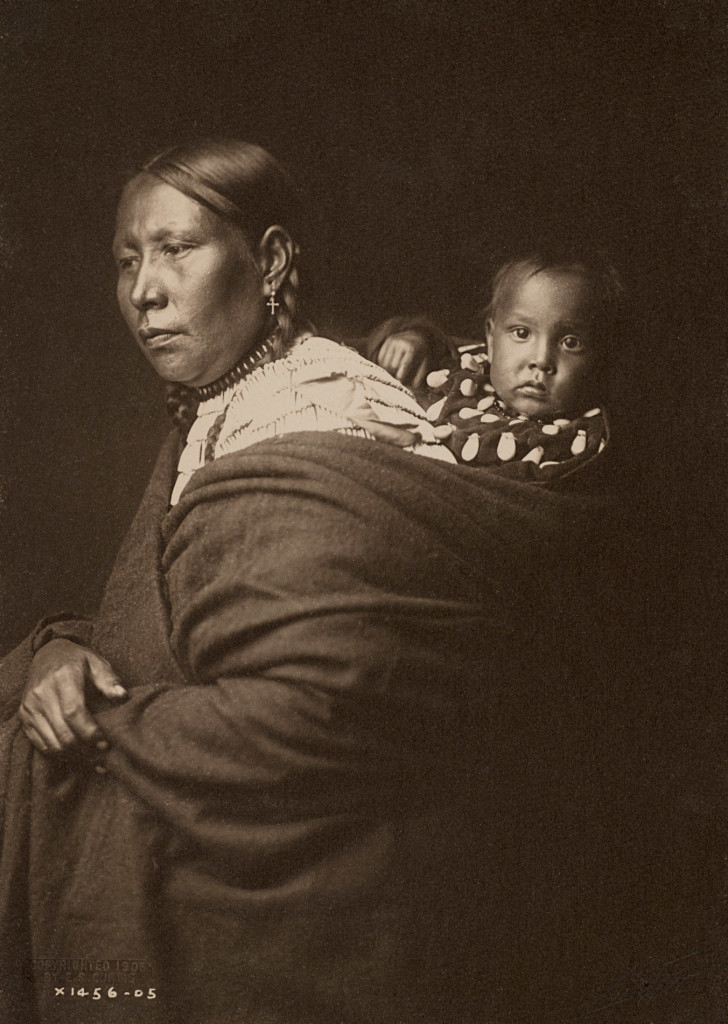 Sioux Mother and Child, 1905, Great Plains (Photo by Edward S. Curtis, courtesy DelMonico Books • Prestel)