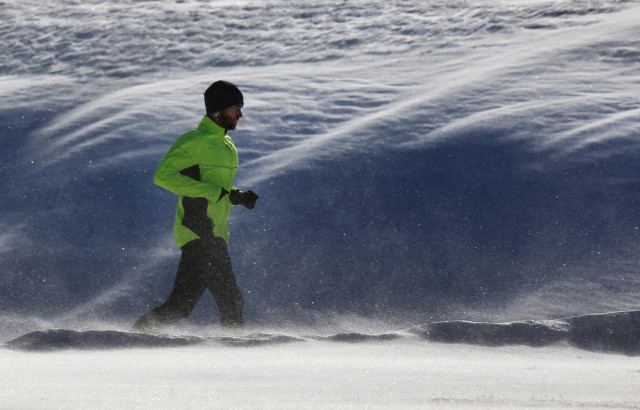 A jogger goes for a run in Maine, where 1.2 million of the state's 1.3 million residents are white. (AP Photo)