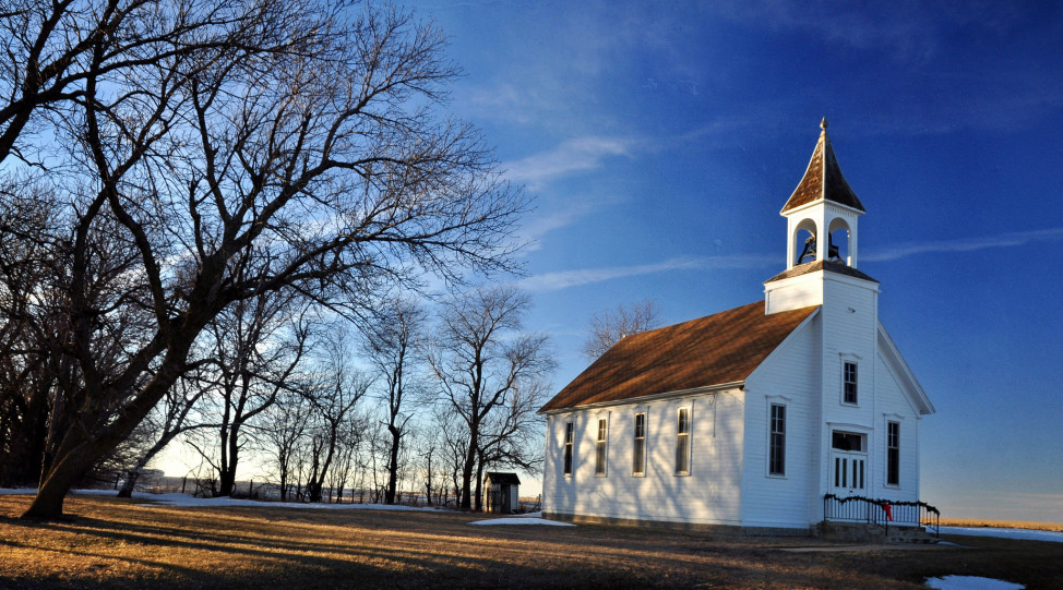 A country church in rural Iowa. (Photo by Flickr user TumblingRun via Creative Commons license) 