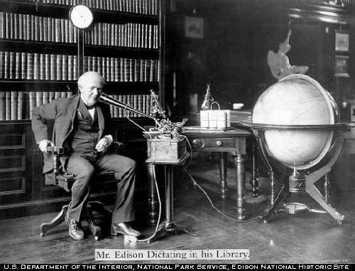 U.S. inventor Thomas Edison speaks into an Edison Dictating Machine, circa 1907. (US Department of the Interior)