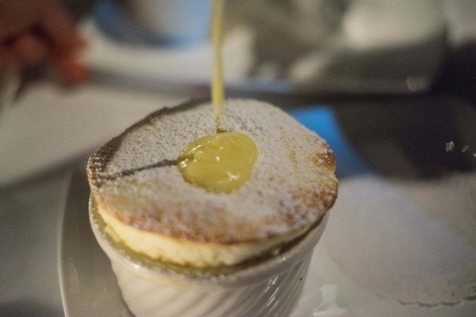 A French restaurant in Cleveland, Ohio, serves up Grand Marnier soufflé with Crème Anglaise. (Photo by Flickr user Edsel Little via Creative Commons license)