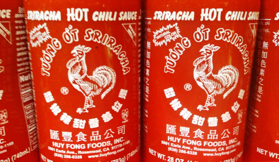 Sriracha is a hot sauce or chili sauce made from chili peppers, distilled vinegar, garlic, sugar and salt. (Photo by Flickr user Mike Mozart via Creative Commons license)