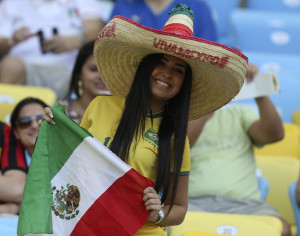 A fan of Mexico smiles before the Confederations Cup Group A soccer match between Mexico and Italy at the Estadio Maracana in Rio de Janeiro