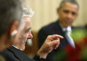 Uruguay's Mujica delivers remarks as Obama welcomes him before their meeting in the Oval Office in Washington