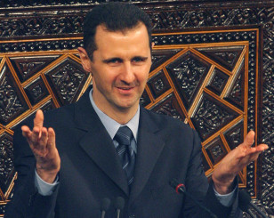 Syrian President Bashar al-Assad addresses parliament in Damascus.