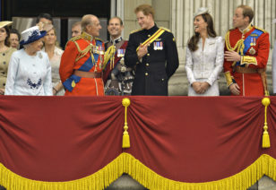 (Front L-R) Britain's Queen Elizabeth, Prince Philip, Prince Harry, Prince William, the Duke of Cambridge and his wife, Catherine, the Duchess of Cambridge share a light moment as they stand on the balcony of Buckingham Palace in the annual Trooping of the Colour ceremony to celebrate the Queen's official birthday in central London, June 14, 2014. REUTERS/Toby Melville (BRITAIN - Tags: SOCIETY ANNIVERSARY ROYALS) - RTR3TQWU