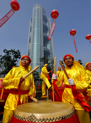 Chinese drummers entertaining guests at the opening ceremony of the Longxi International Hotel