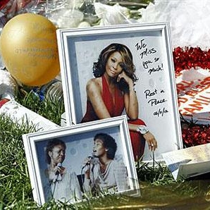 A makeshift memorial to Whitney Houston is seen in front of The Beverly Hilton hotel in Beverly Hills, California, (AP February 17, 2012)