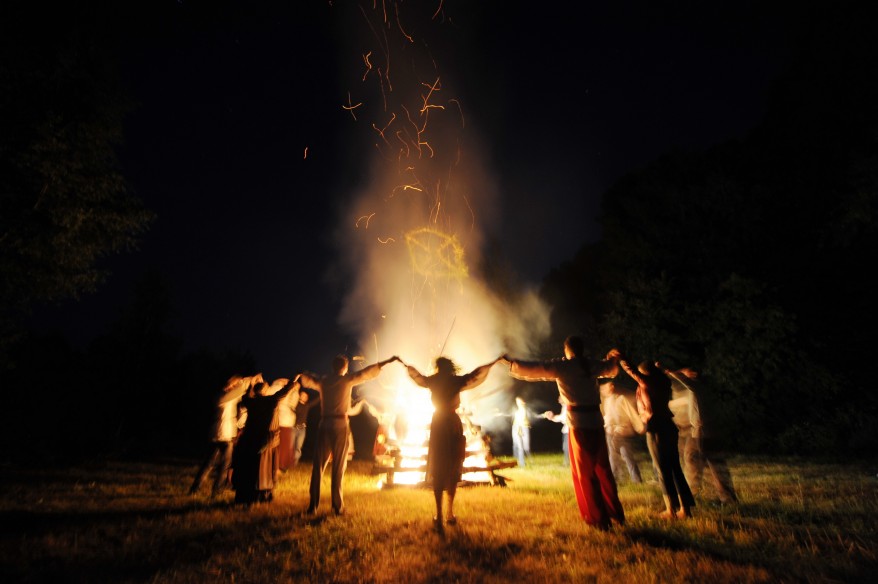 Belarussians in traditional costumes dance around a fire near the village of Raduga in the Gomel region, some 300 kms southeast the capital Minsk, to mark Ivana Kupala night, an ancient heathen holiday. During the celebrations, dating back to pagan times, people wear wreathes, jump over fires and bathe naked in rivers and lakes. (AP)