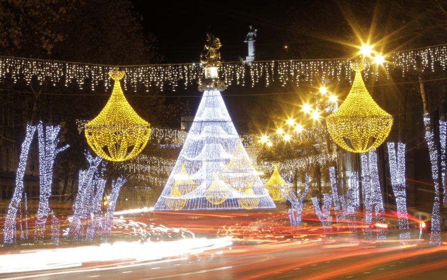 9Cars drive on a street which is illuminated for New Year's Eve in Tbilisi