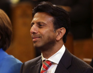 Louisiana Gov. Bobby Jindal attends a funeral Mass for artist George Rodrigue, at St. Louis Cathedral in New Orleans, Thursday, Dec. 19, 2013. "Duck Dynasty" patriarch Phil Robertson - suspended from the series indefinitely after making disparaging remarks about gays - is getting some support from key followers, including Jindal. He lamented the suspension on free speech terms. "It's a messed-up situation when Miley Cyrus gets a laugh, and Phil Robertson gets suspended," he said in a statement Thursday. The show is filmed in his state. (AP Photo/Gerald Herbert)
