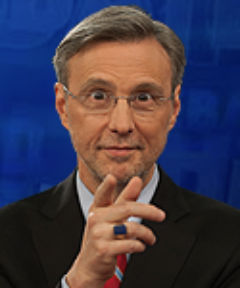 Том Хартманн, ведущий передачи «Общая картина» на финансируемом Кремлем телеканале RT: критика Америки с американским акцентом. Фото: RT