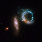 A pair of gravitationally interacting galaxies called Arp 147 (Photo: NASA, ESA, and M. Livio (STScI)