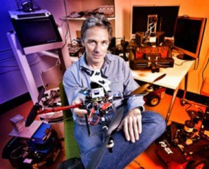 Professor Peter Corke from the Queensland University of Technology in Brisbane, Australia, with his flying robot. (Photo: Erika Fish)