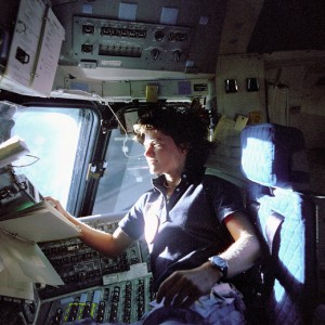 In this June 1983 photo released by NASA, astronaut Sally Ride, a specialist on shuttle mission STS-7, monitors control panels from the pilot's chair on the shuttle Challenger flight deck. (Photo: AP Photo/NASA, File)