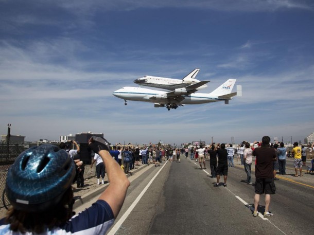 A shot of the space shuttle Endeavour, atop the Shuttle Carrier Aircraft, when it recently landed  at the Los Angeles International Airport.  The flight marked the final scheduled ferry flight of the Space Shuttle Program.  The shuttle will be placed on public display at the California Science Center. (Photo: NASA/Matt Hedges)