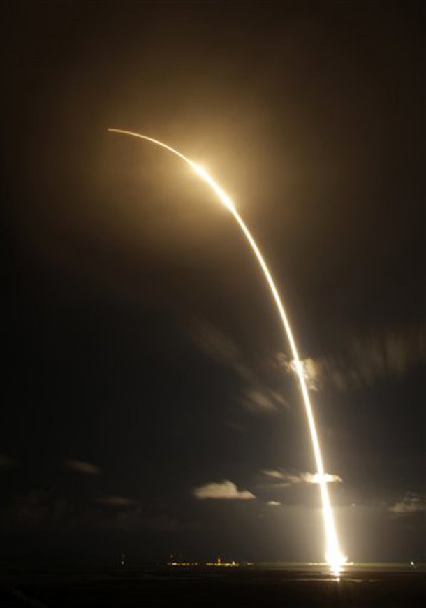 This time exposure photo shows the Falcon 9 SpaceX rocket lifting off from the Cape Canaveral Air Force Station in Cape Canaveral, Florida. The rocket with it's Dragon space capsule payload just made its first commercial delivery of supplies to the International Space Station. (Photo: AP)