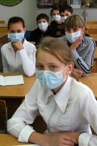 Students in Kazakhstan wear surgical masks to help prevent the spread of flu during the 2009 swine flu outbreak.  An influenza forecasting system such the one Jeff Shaman and colleagues are developing could help health officials better plan for upcoming outbreaks. (Photo: Nikolay Olkhovoy via Wikmedia Commons)