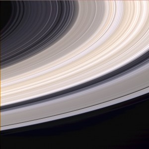 Image of Saturn's rings taken from the Cassini spacecraft show that different rings have slightly different colors. The ring particles are mostly light water-ice. (NASA)