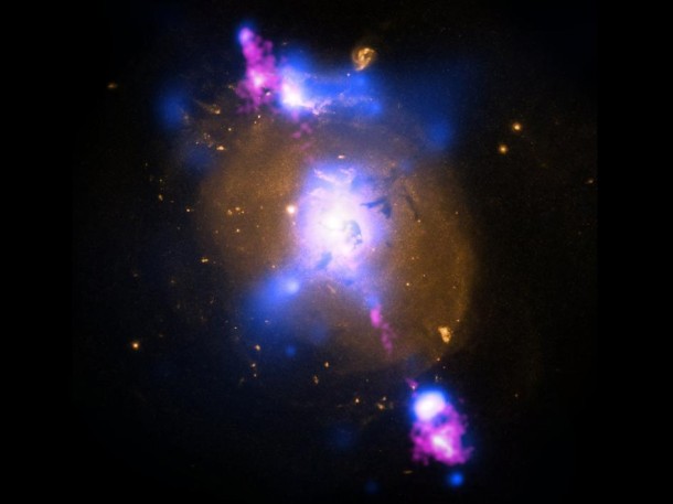 A supermassive black hole at the center of this galaxy 850 million light years from Earth generates two powerful jets of particles that are speeding out at millions of kilometers per hour (NASA\NSF\NRAO\VLA)