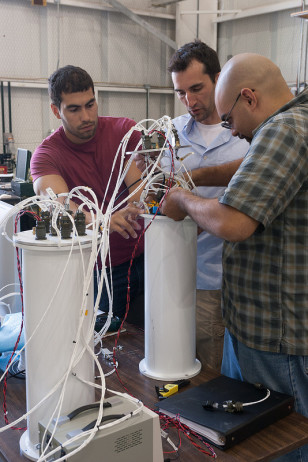 Scientists work on a project for NASA's Goddard Flight Center (NASA/Albert Shih)