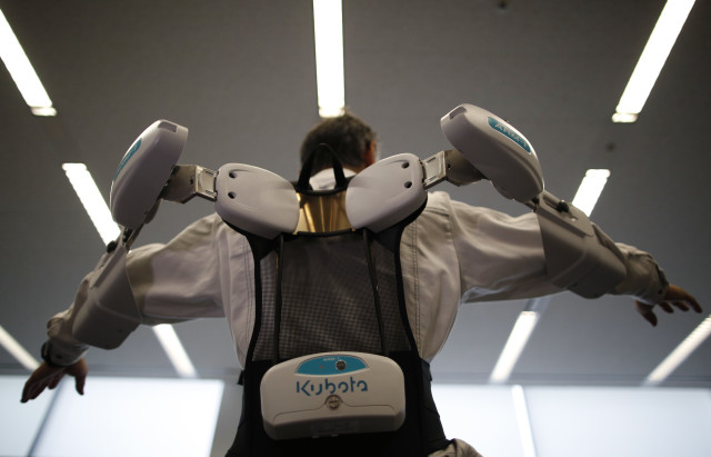 A new robotic exoskeleton called PowerLoader has been created to help farmers and construction workers do things that no ordinary human can do on their own.  The robotic helper, which is worn by its user and nicknamed the Ninja was demonstrated in Tokyo on June 2, 2014. (Reuters)