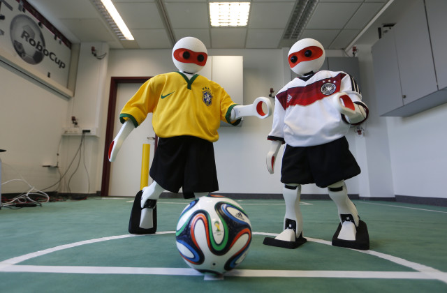 Even robots are getting into the spirit of the World Cup games.  These humanoid robots which are dressed in the colors of Germany's and Brazil's national soccer team are getting set to compete with other robots in their own version of the World cup called the “RoboCup”, which takes place in Brazil from July 21st through July 24th. (Reuters)