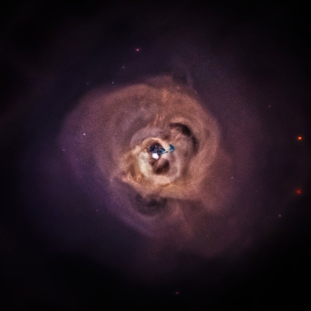 NASA released this new composite image of the Perseus Galaxy Cluster on June 24, 2014.  The composite was made from a number of observational images taken over a decade by the Chandra X-Ray Observatory.  According to NASA the Perseus Cluster is one of the most massive objects in the Universe and it contains thousands of galaxies that are surrounde by a huge cloud of superheated gas.  (NASA) 