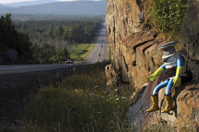 Last week we introduced you to the hitch-hiking robot, ‘hitchBOT’ as he prepared to thumb his way across Canada.  We check in on hitchBot who is seen here next to Highway 17 north of Sault Ste. Marie, Ontario on August 5, 2014. Latest reports have the robotic hitch-hiker at the halfway point in its cross-country journey. (Reuters)