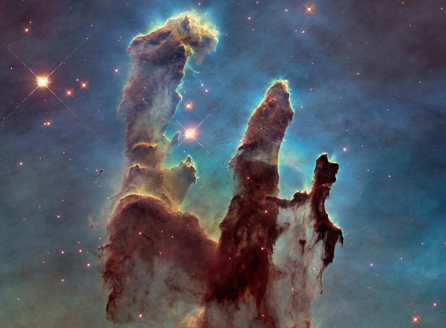 Hubble Space Telescope image of the Eagle Nebula’s “Pillars of Creation”, released  1/6/15.  (NASA/ESA/Hubble Heritage Team)