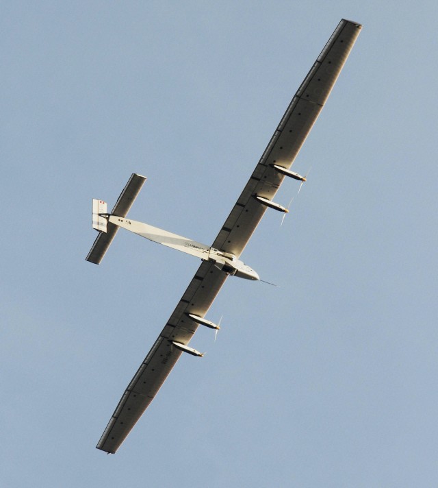The Solar Impulse-2 takes off from Ahmadabad, India on 3/18/15 as it begins the third leg of its’ historic round-the-world trip. The sun-powered aircraft began its voyage on 3/9/15 in Abu Dhabi, UAE where it is scheduled to return in 8/15 (AP/Press Trust of India)