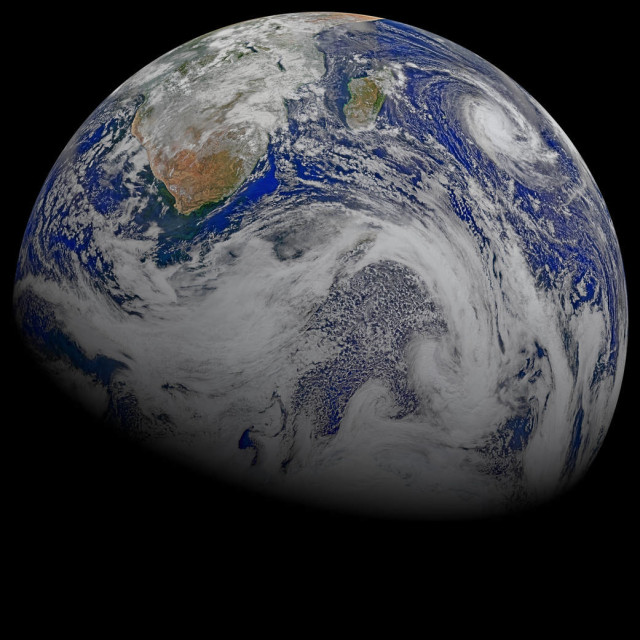 NASA/NOAA Suomi National Polar-orbiting Partnership spacecraft captured this combination image of Southern Africa and the surrounding oceans on 4/9/15 and released it to the public on 4/21/15 just in time for Earth Day the following day.  Note: Tropical Cyclone Joalane can be seen (upper right side) over the Indian Ocean.  (Ocean Biology Processing Group/Goddard Space Flight Center)