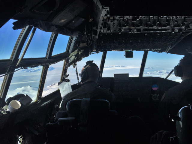 The flight deck of the C-130 as it heads to The Amundsen–Scott South Pole Station in Geographic South Pole, the southernmost place on Earth. (Photo by Refael Klein)