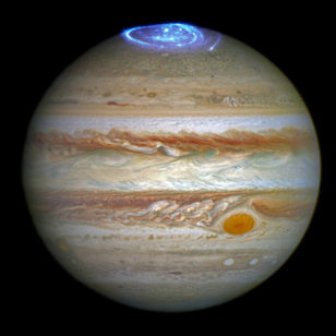 Astronomers are using NASA's Hubble Space Telescope to study auroras — stunning light shows in a planet's atmosphere — on the poles of the largest planet in the solar system, Jupiter. (NASA, ESA, and J. Nichols (University of Leicester))