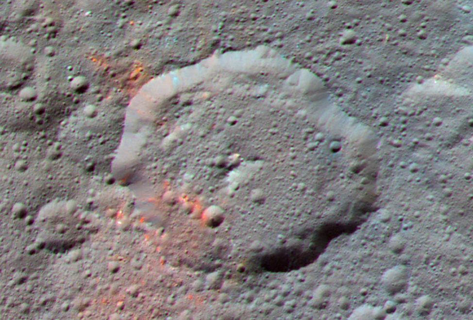 NASA’s Dawn spacecraft snapped this enhanced color composite image of an area around the Ernutet crater on the dwarf planet Ceres. Dawn scientists say that the red areas in this photo, released 2/16/17 could be evidence of organic material. (NASA/JPL-Caltech/UCLA/MPS/DLR/IDA)