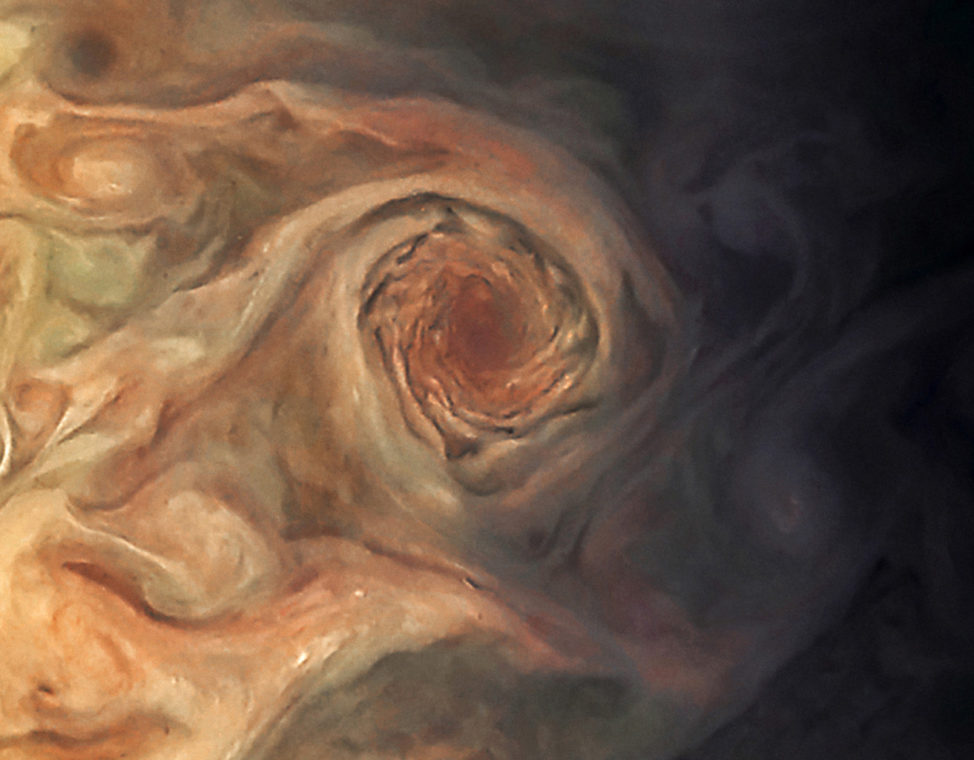 This image, taken on 3/27/17, by the JunoCam imager on NASA's Juno spacecraft, focuses on a swirling storm just south of one of the white oval storms on Jupiter. NASA says at the time the image was taken, the spacecraft was about 20,000 kilometers from the planet. (NASA/JPL-Caltech/SwRI/MSSS/Jason Major)
