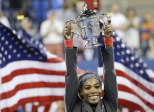 Serena Williams lifts the U.S. Open trophy in New York Photo: AP
