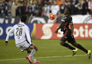 D.C. United midfielder Patrick Nyarko (R) chases the ball in a recent match. Photo: Nick Wass/AP
