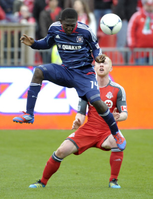 Patrick Nyarko leaps for the ball while playing for the Chicago Fire. Photo: Mike Cassese/Reuters