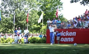 Ernie Els begins play at the first tee during the final round of the Quicken Loans National at the Congressional Country Club in Bethesda, Maryland. (photo by Bill Workinger / Voice of America)