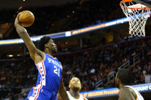 Joel Embiid dunks in a game against the defending NBA champion Cleveland Cavaliers. Photo: Aaron Doster-USA TODAY Sports