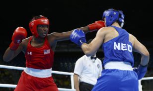 Claressa Shields (L) lands a punch against Dutch opponent Nouchka Fontijn in the Olympic women's middleweight final in Rio. Photo: Peter Cziborra / Reuters