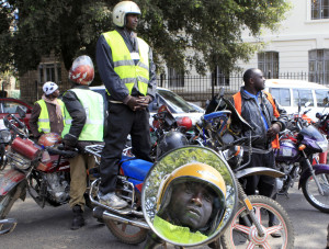 FILE - Kenyan motorcyclists park along a main street to protest over what they say is harassment by the City Council of Nairobi inspectors on traffic offenses within the capital. (Reuters)