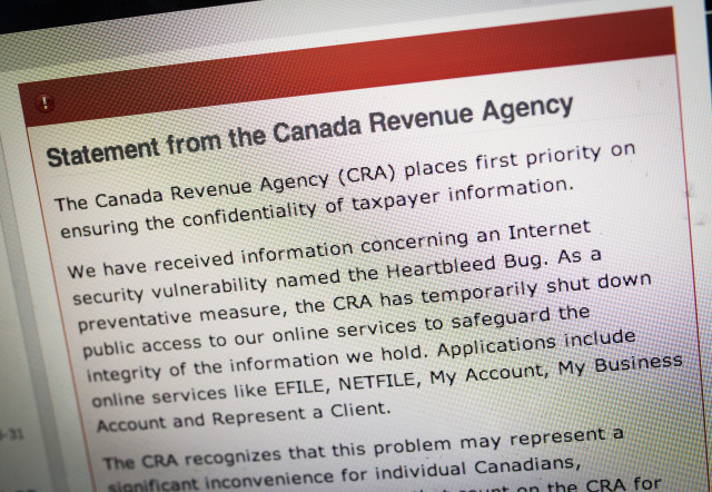The Canada Revenue Agency website is seen on a computer screen displaying information about an internet security vulnerability called the "Heartbleed Bug" in Toronto. (Reuters)